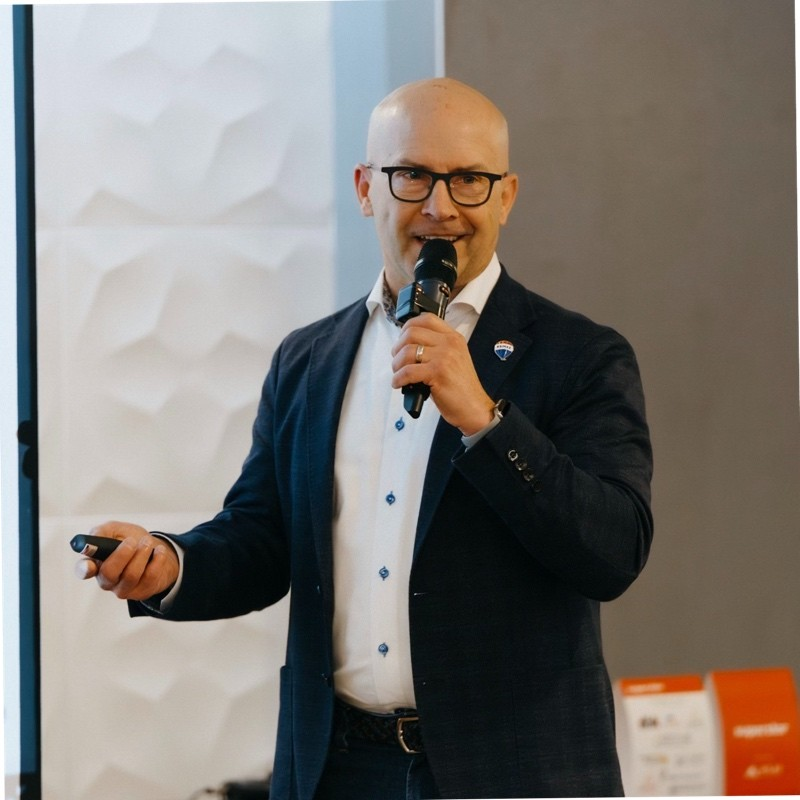 Regina REALTOR® Craig Adam speaking at a real estate industry event about client trust and online reviews.